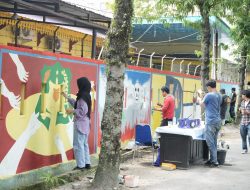 Ada Suasana Berbeda, Ketika Pagar Tembok Kantor Camat Medan Helvetia “Dicoret-coret” Seniman…
