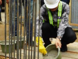 Amril Selaku Sekdakab Langkat Meletakkan Batu Pertama Pembangunan LabKesda Dinas Kesehatan