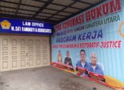 Baliho Besar di Kantor Dr. Muhammad Sa’i Rangkuti: Dedikasi Advokasi Hukum dan Dukungan Penuh untuk Bobby-Surya di Pilgub Sumut 2024