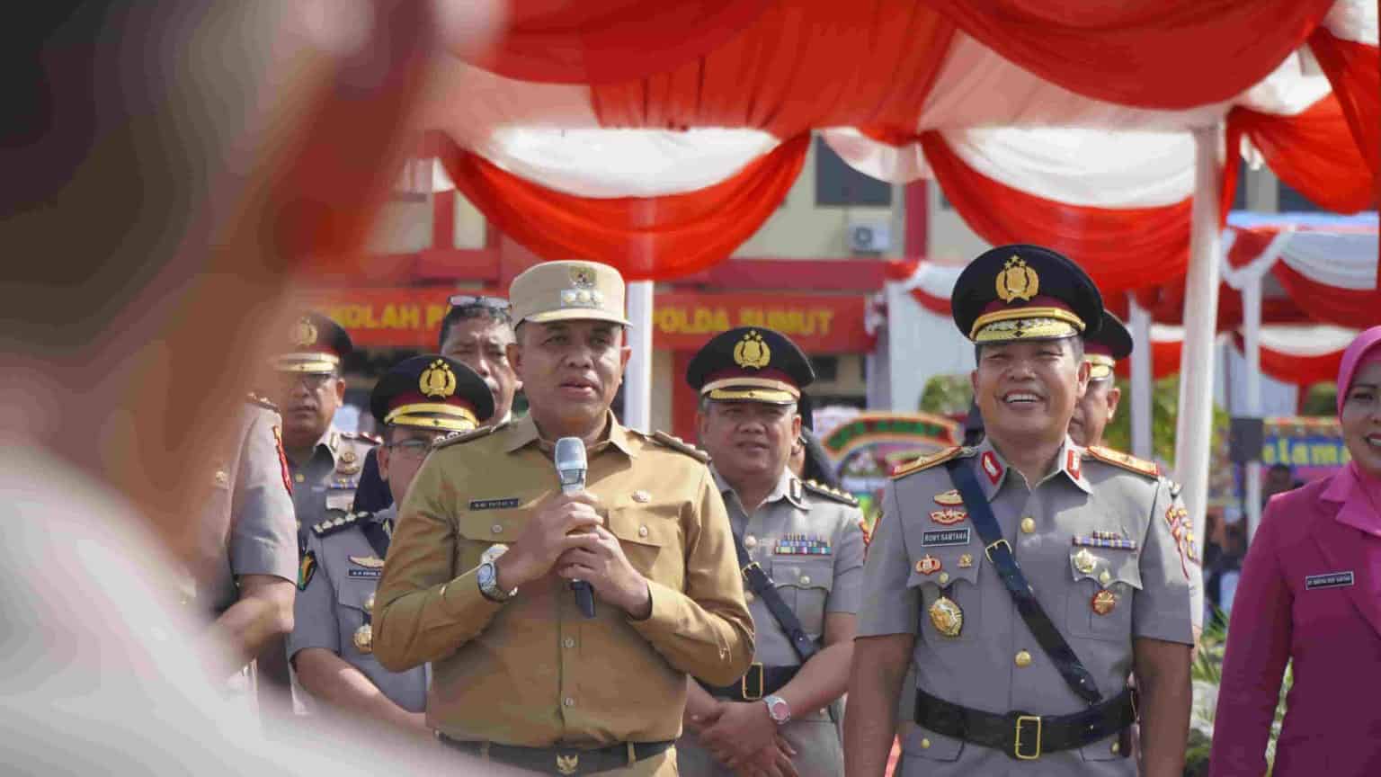 Pj. Bupati Langkat H.M. Faisal Hasrimy, AP., M.AP, saat menghadiri Upacara Pembukaan Pendidikan Pembentukan Bintara dan Tamtama Polri Gelombang II T.A 2024 yang diselenggarakan di Lapangan Upacara Satya Haprabu Sekolah Polisi Negara (SPN) Polda Sumut Hinai, pada Senin pagi (22/7/2024).(pelitaharian.id/ist)